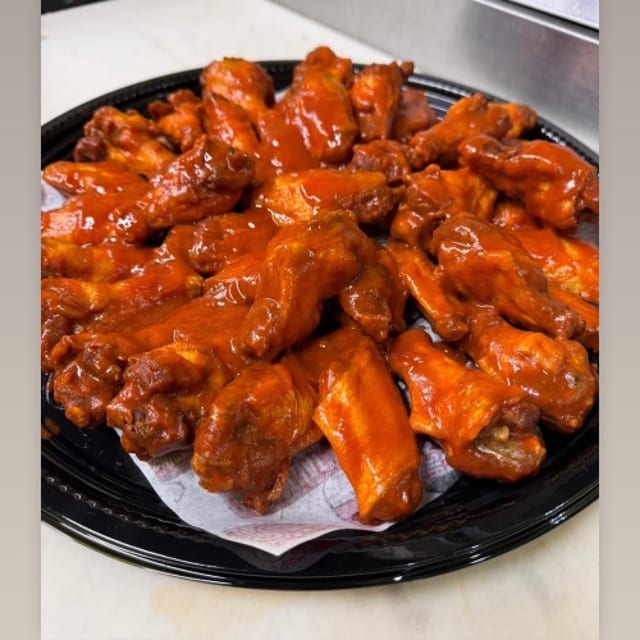 100 Wings (Up to 5 Flavors).